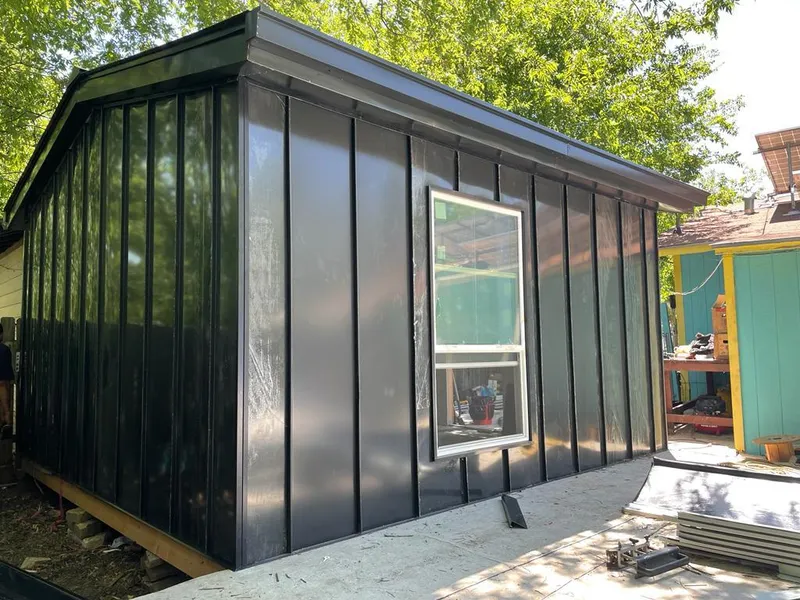 Black standing seam metal wall panels for Roof Inspection in Orland Park