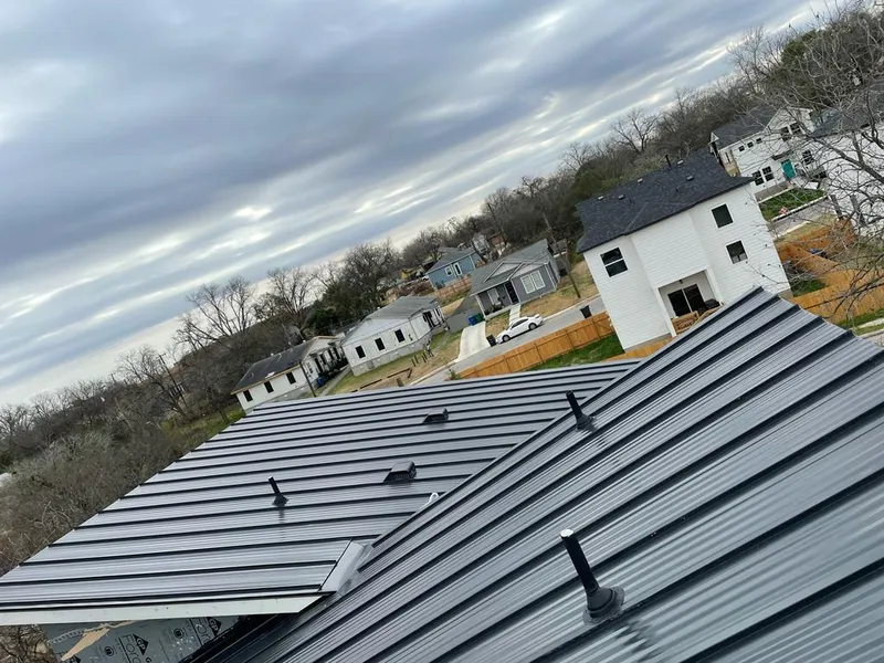 Standing seam metal roof panels with vents for Skylight Repair in Orland Park